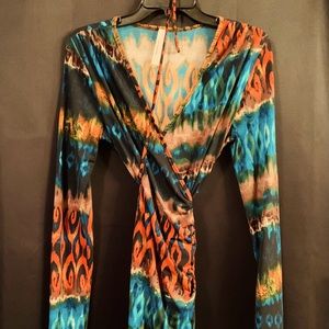 Wrap around knee length dress.